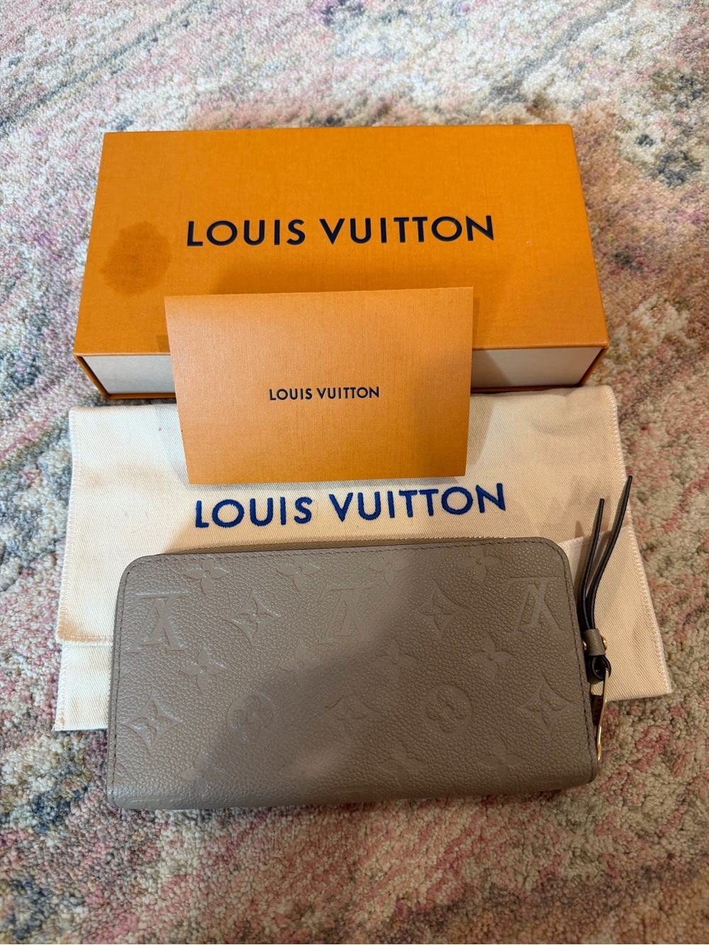 Louis Vuitton Embossed Monogram Zip Wallet in Taupe Gray